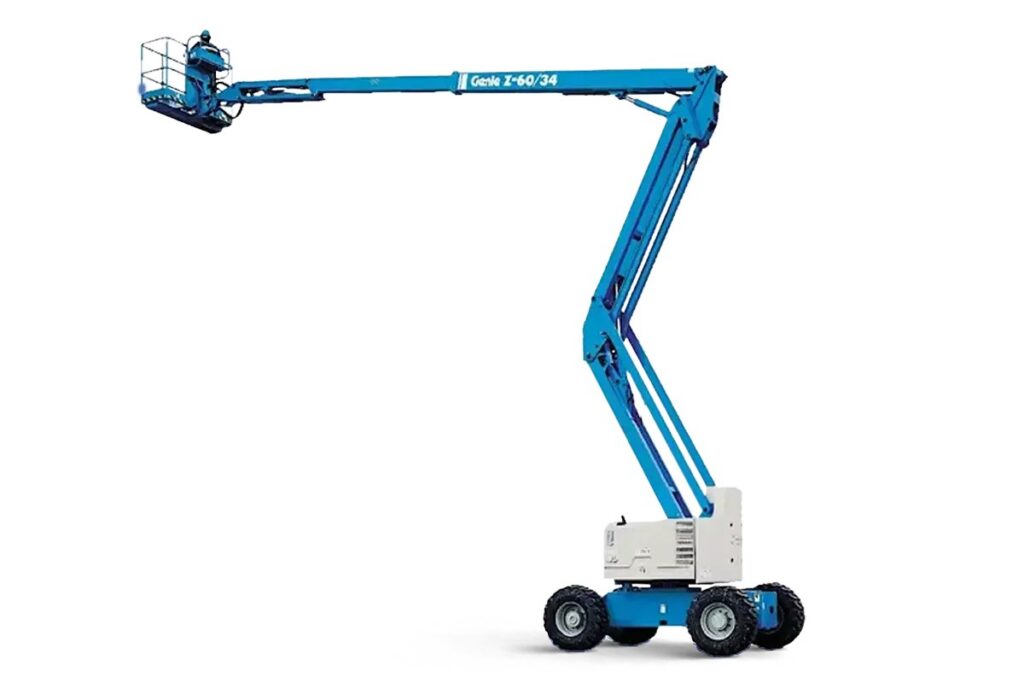 Genie articulating boom lift with its blue boom and jib extended out to the side and a white turntable on a blue chassis