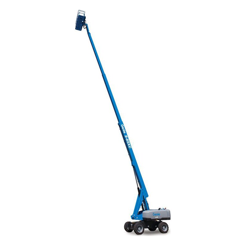 Genie S-85 XC telescopic boom lift with its blue boom fully raised and the platform at height, on a gray turntable and rough-terrain chassis