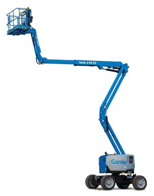Genie Z-45 XC rough terrain articulating boom lift on off-road tires with its boom and jib raised